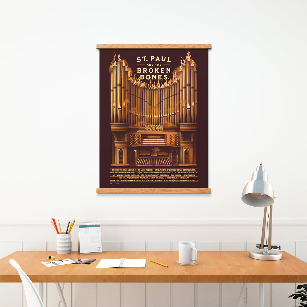 Natural oak magnetic frame holding poster on wall by a desk